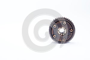 The mechanism for changing the timing of the timing. Round shape exhaust camshaft regulator isolated on white background.