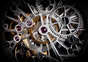 Mechanism, clockwork of a watch with jewels, close-up. Vintage luxury