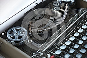 Mechanism and keyboard of an old typewriter with film coil