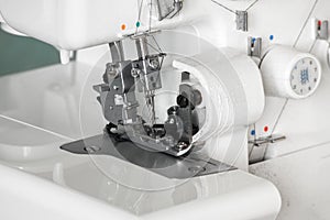 The mechanism of the needle of the sewing machine close-up. Focus on needle