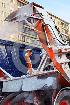 Mechanism of snowplows closeup. Snow removal equipment works on the streets of the city.