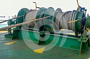 Mechanisms of tension control ropes. Winches. Equipment on the deck of a cargo ship or