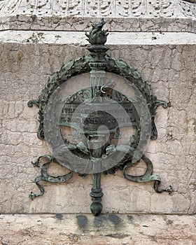Medallion on the monumental sculpture of Luigi Galvani in the Luigi Galvani Square in Bologna, Italy.
