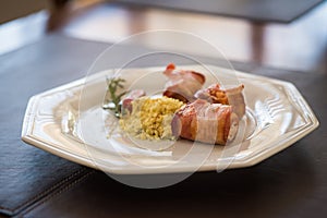 medallion, pork rolled in bacon served in churrascaria. photo