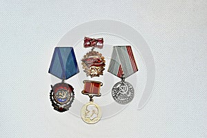 Medals and orders of the USSR under the name Veteran of Labor, Red Banner, a sign of the Winner of the Competition.