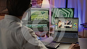 Media colorist editing video montage on visual effects software