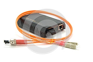 Media converter and fiber optic cord. photo