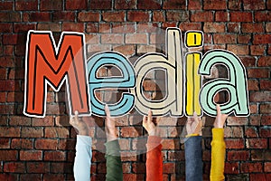 Media Word Concepts and Brick Background