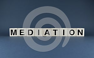Mediation. Cubes form the word Mediation