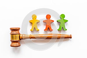 Mediator conflict resolving. Judge gavel with wooden figures arbitrator between opponents