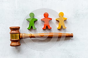 Mediator conflict resolving. Judge gavel with wooden figures arbitrator between opponents