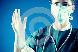 Medic with gloves ready for surgery photo