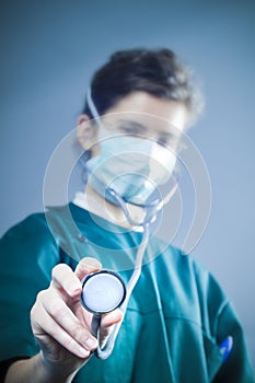 Medic with stethoscope photo