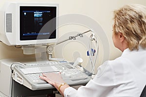 Medic using ultrasound system photo
