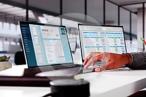 Medical Account Manager In Office Analyzing Codes