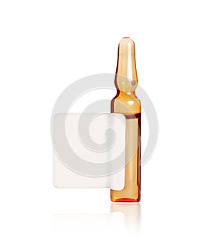 Medical ampoule with unfolded label close-up isolated on a white background