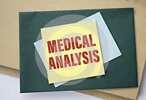 Medical analysis text . Concept means a report or noteworthy medical breakthrough information. gray background photo