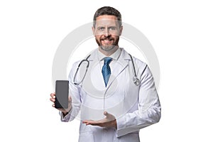 medical application. happy man doctor presenting medical phone application. emedicine in your phone