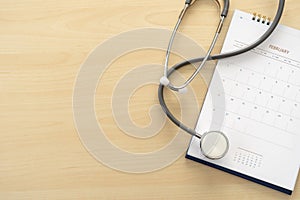 Medical appointment book in the calendar stethoscope and calendar schedule to check up