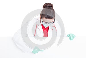 Medical assistant pointing on blank cardboard