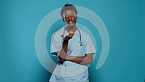 Medical assistant wearing uniform and stethoscope