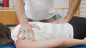 Medical back massage during a rehabilitation