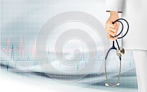 Medical background with hand holding a stethoscope