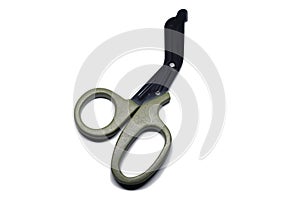 Medical bandage khaki scissors isolated on white background. trauma sheers.