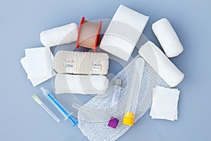 Medical bandages with sticking plaster and syringes