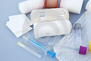 Medical bandages with sticking plaster and syringes