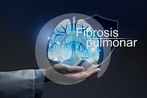Medical banner Pulmonary fibrosis with spanish translation Fibrosis pulmonar on blue background with  large copy space photo