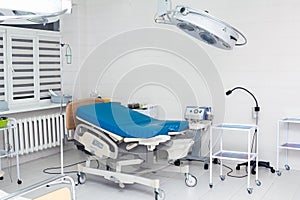 Medical bed in labour room at modern hospital