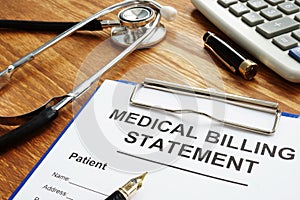 Medical billing statement, pen and stethoscope. Affordable health care