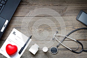 Medical blog with notebook heart and stethoscope medicine background concept