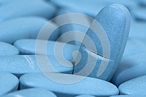 Medical blue pills macro background