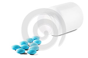 Medical blue pills and white bottle on white isolated background. Concept of healthcare and medicine.