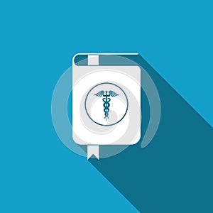 Medical book and Caduceus medical symbol icon isolated with long shadow. Medical reference book, textbook, encyclopedia