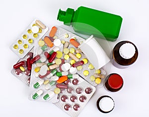 Medical bottles and foil blisters with the capsules and tablets