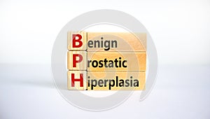 Medical and BPH, Benign Prostatic Hyperplasia symbol. Wooden blocks with the word `BPH`. Beautiful white background. Copy space.