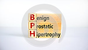 Medical and BPH, Benign Prostatic Hypertrophy symbol. Wooden blocks with the word `BPH`. Beautiful white background. Copy space.