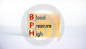 Medical and BPH, Blood Pressure High symbol. Wooden blocks with the word `BPH, Blood Pressure High`. Beautiful white background.