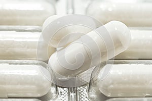 Medical capsules, pills on a white background close-up. Medical drug. Health. Treatment