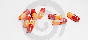 Medical capsules on a white background. Close-up banner with medicine capsules