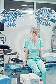Medical center worker staring at camera with smile photo