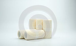 Medical cohesive elastic bandage on white background