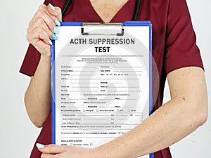 Medical concept about ACTH SUPPRESSION TEST with sign on the piece of paper