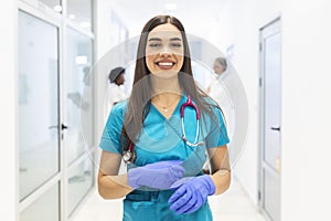 Medical concept of beautiful female doctor with stethoscope, waist up. Medical student. Woman hospital worker looking at camera