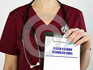 Medical concept about BLOOD CARBON MONOXIDE LEVEL with inscription on the sheet