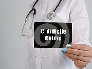 Medical concept about C. difficile Colitis with phrase on the piece of paper
