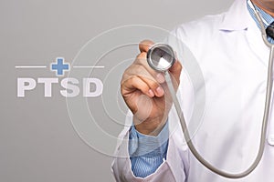 Medical Concept. Doctor holding a stethoscope and PTSD - post tr photo